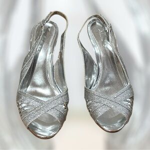 Aldo Sparkling Silver Women's Heels
Size 36